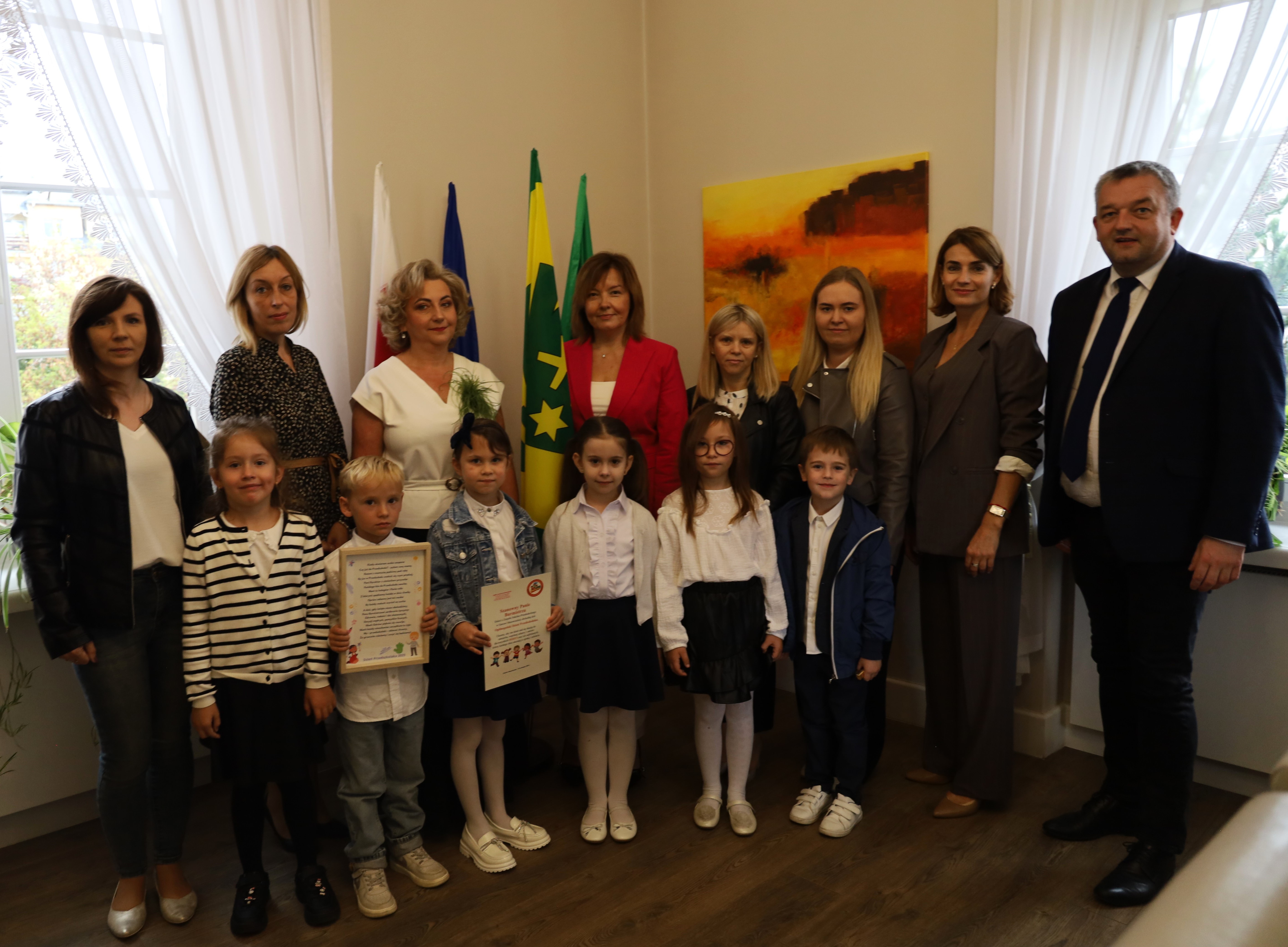 kobiety i mężczyzna i dzieci w gabinecie